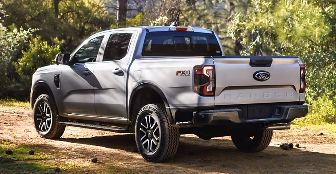 The 2024 Ford Ranger parked off-road in a wooded area