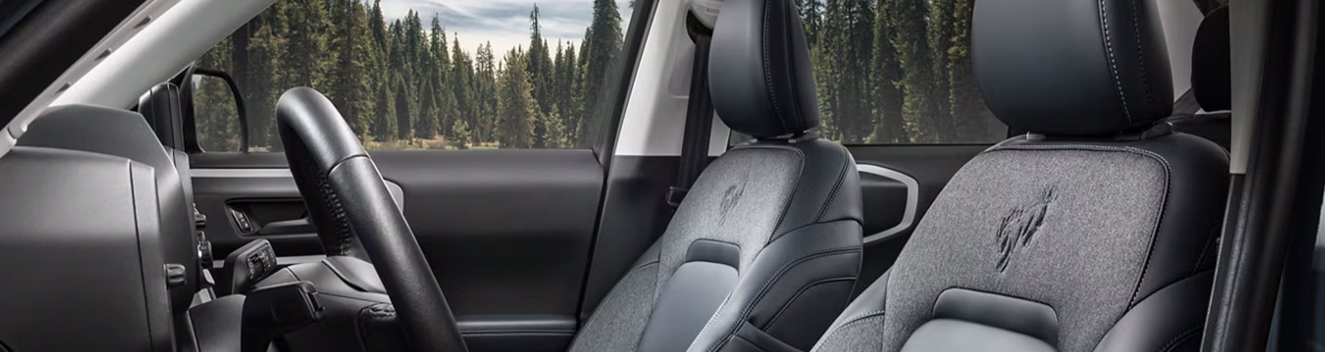 A close-up of the interior of a ford vehicle in grey