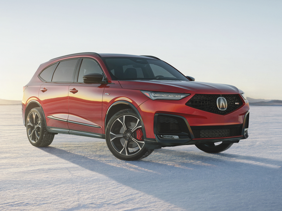 An Acura MDX Type S finished in Performance Red Pearl.