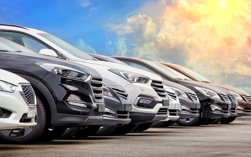 A line-up of Hyundai models parked side by side.