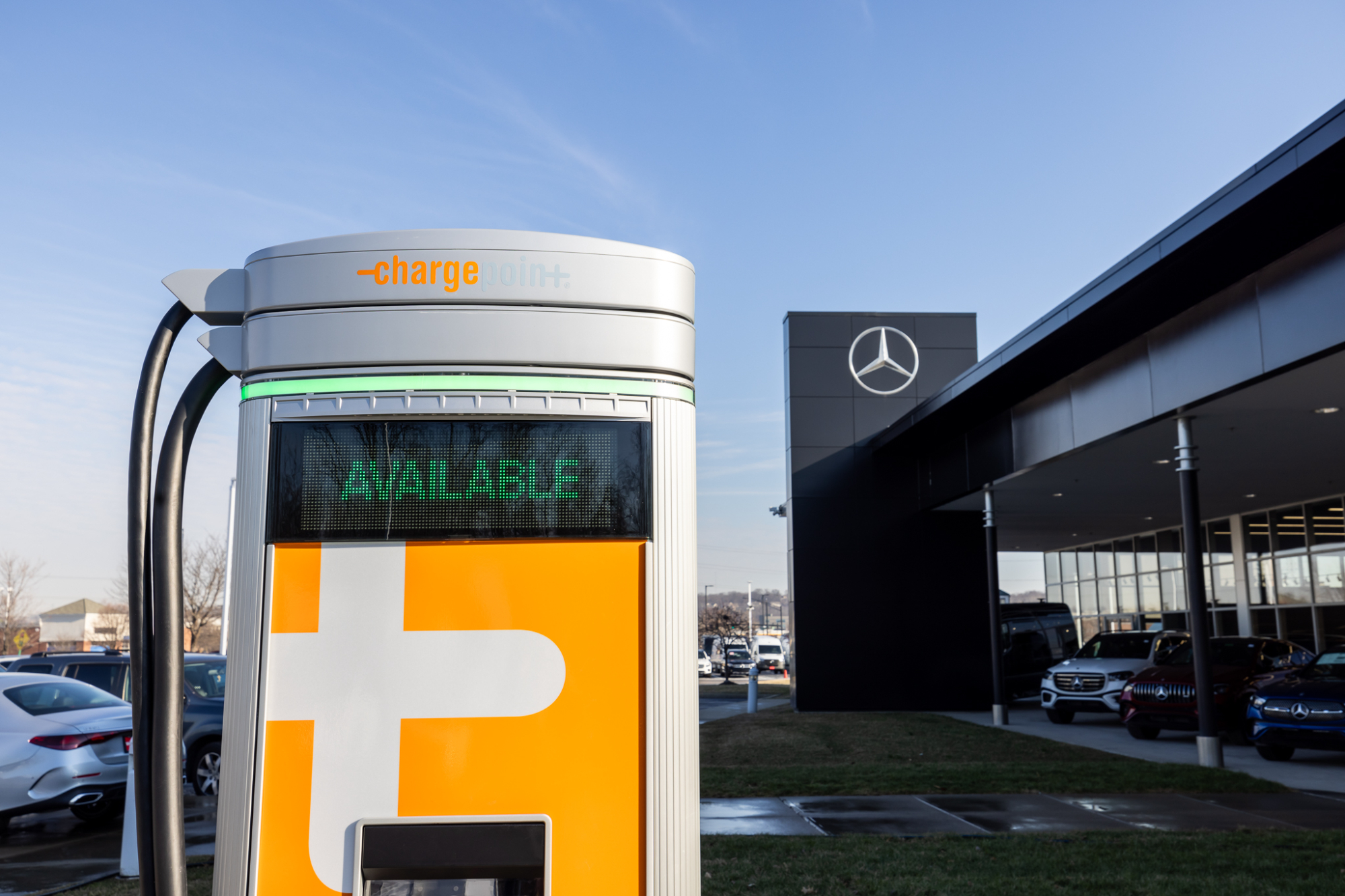 Mercedes-Benz eletric vehicle parked at a dealership ChargePoint charging station