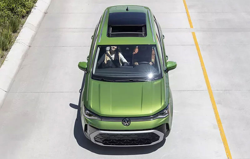 A Volkswagen Taos driving down a road