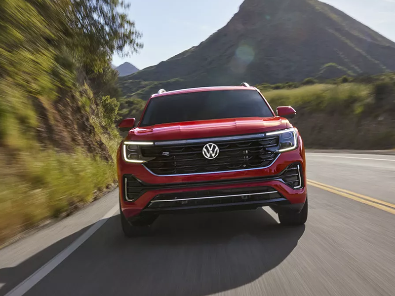 A Volkswagen Atlas driving through mountains