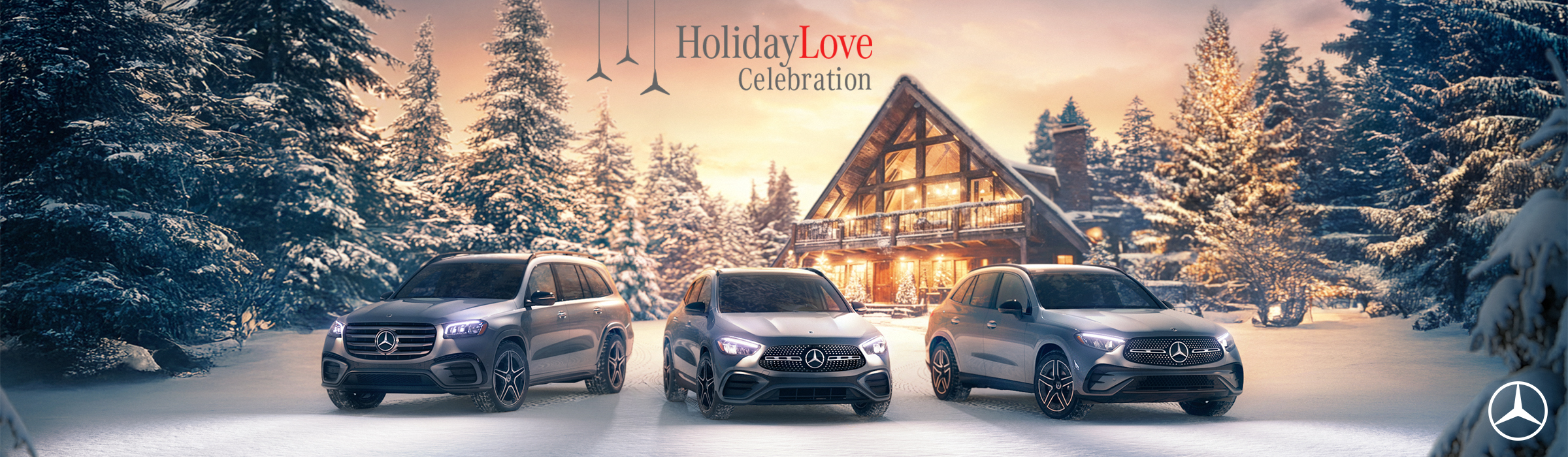 The Mercedes-Benz Holiday Love celebration sales banner featuring a Mercedes-Benz model lineup on display and winter holiday decorations